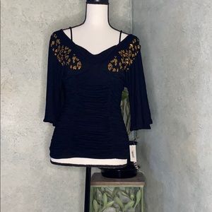 Black xoxo off shoulder shirt